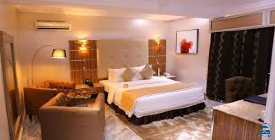 THE WELLS CARLTON HOTEL AND APARTMENTS
